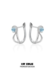 1ST XULIE Jewelry "Snake Bite" Coiled Python Huggie Hoop Earrings in 925 Sterling Silver - Lifestyle Shot