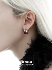 1ST XULIE "Soaring Cranes" Asymmetrical Crane Statement Feather Spiral Earrings in Platinum Plated Brass - On Model Close-Up