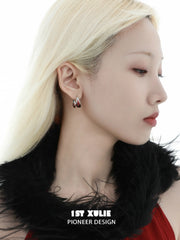 1ST XULIE "Soaring Cranes" Asymmetrical Crane Statement Feather Spiral Earrings in Platinum Plated Brass - Texture Shot