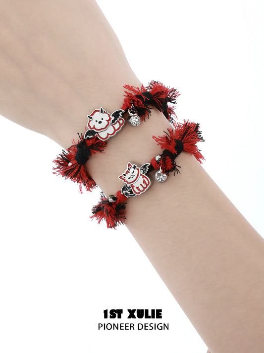 1ST XULIE Jewelry "DEMON CUTIES" Devil Kitten & Puppy Charm Bracelet in Platinum Plated Brass - On Model Close-up