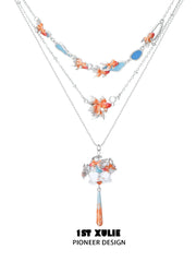 1ST XULIE Jewelry "THE SEA" Dreamy Goldfish Layered Pendant Necklace in Brass and Resin - Angle 2