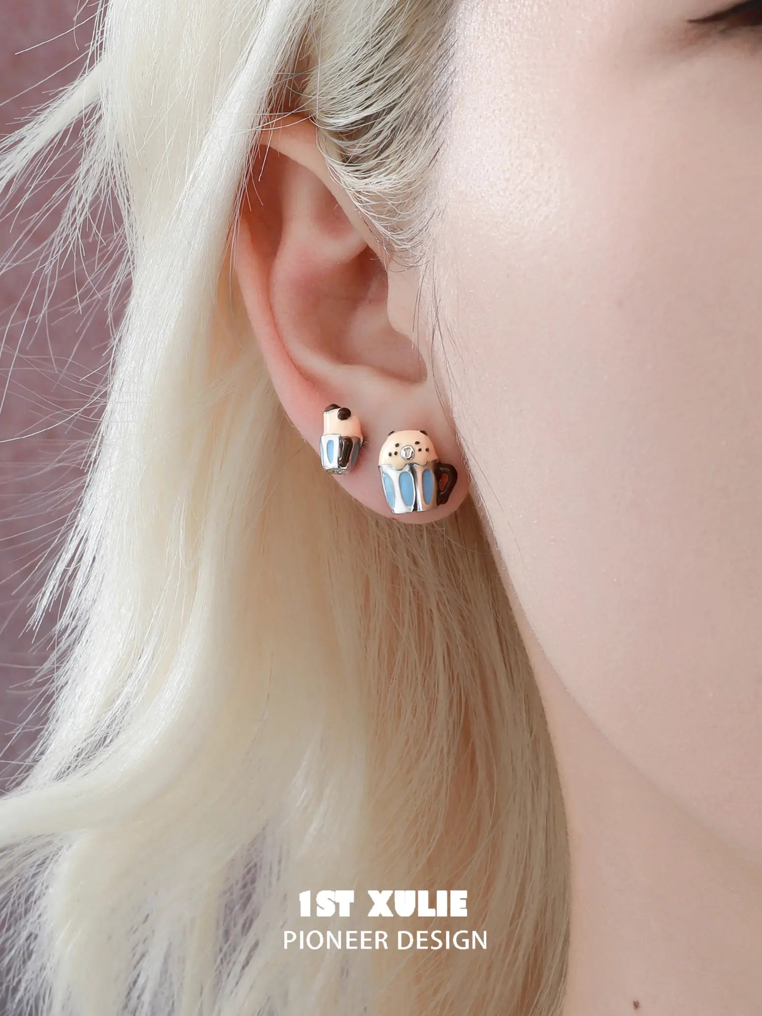 1ST XULIE Jewelry "POUR-OVER CAPYBARA" Enamel Capybara Stud Earrings in Brass and Enamel - Lifestyle Shot