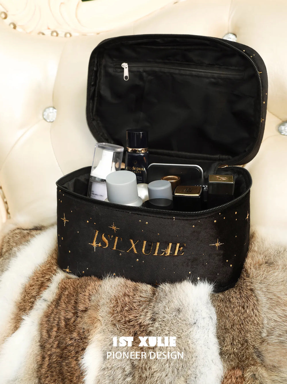 Open black 1ST XULIE makeup bag showing the interior zip pocket; cosmetics are not included.