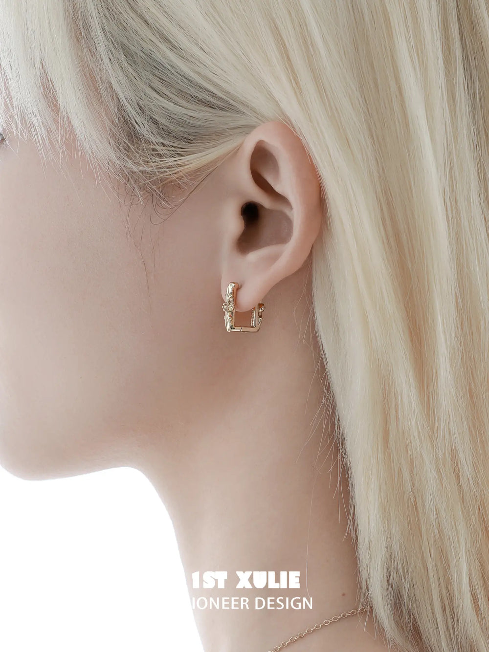 1ST XULIE Jewelry "Bastet" Iris Dangle Huggie Hoop Earrings in Platinum Plated - On Model