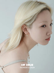 1ST XULIE Jewelry "Bastet" Iris Zircon Stud Earrings in 925 Sterling Silver - Style B On Model