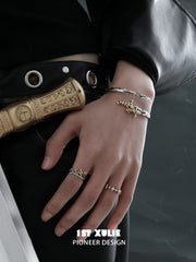 1ST XULIE Jewelry "Knight's Oath" Knight's Sword Adjustable Cuff Bracelet in 18K Gold Plated Brass - Angle View