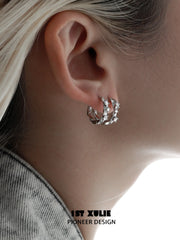 1ST XULIE "Star Trails" Möbius Twist Pavé Huggie Earrings in 925 Sterling Silver - Product View