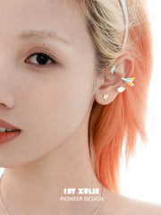 1ST XULIE Jewelry "Juicy Flight" Asymmetrical Paper Airplane No-Piercing Ear Wraps in Platinum Plated - Detail Shot