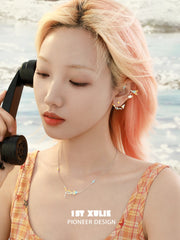 1ST XULIE Jewelry "Juicy Flight" Asymmetrical Paper Airplane No-Piercing Ear Wraps in Platinum Plated - On Model
