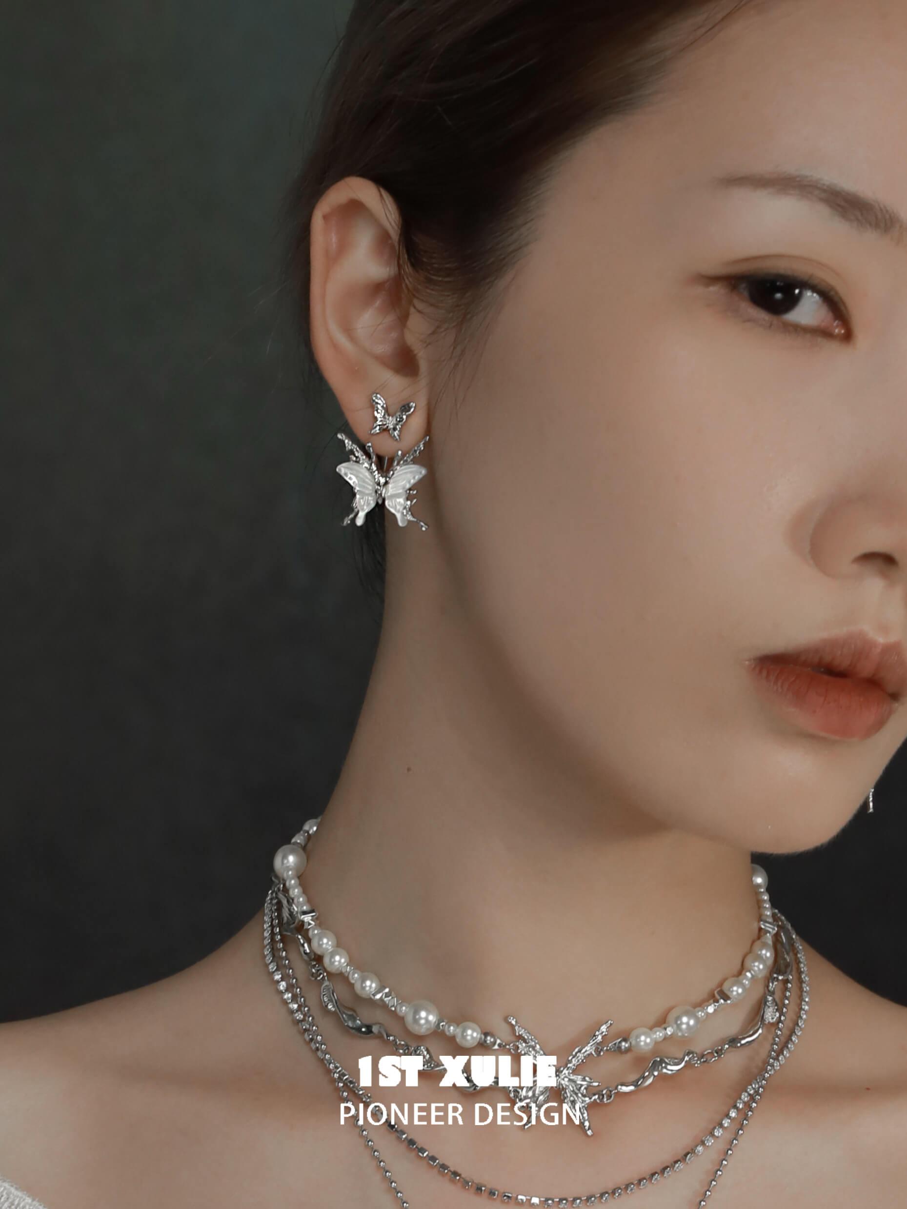 1ST XULIE "Whiterfly" Skeletal Shell Earrings in Platinum Plated 925 Silver - Lifestyle Shot