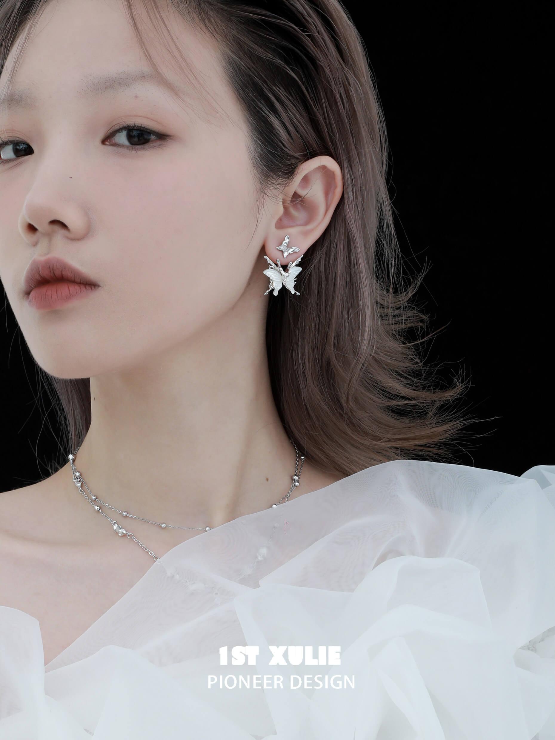 1ST XULIE "Whiterfly" Skeletal Shell Earrings in Platinum Plated 925 Silver - Side View