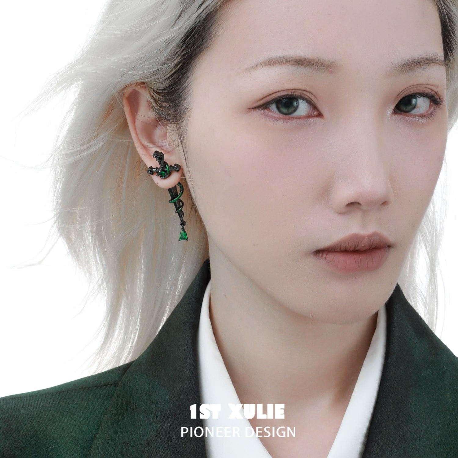 1ST XULIE "Slytherin House" Gothic Snake Sword Dangle Stud Earrings in Platinum Plated - On Model Detail Shot