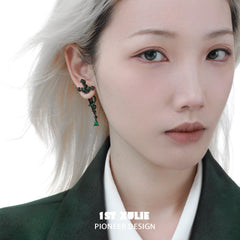 1ST XULIE "Slytherin House" Gothic Snake Sword Dangle Stud Earrings in Platinum Plated - On Model Detail Shot