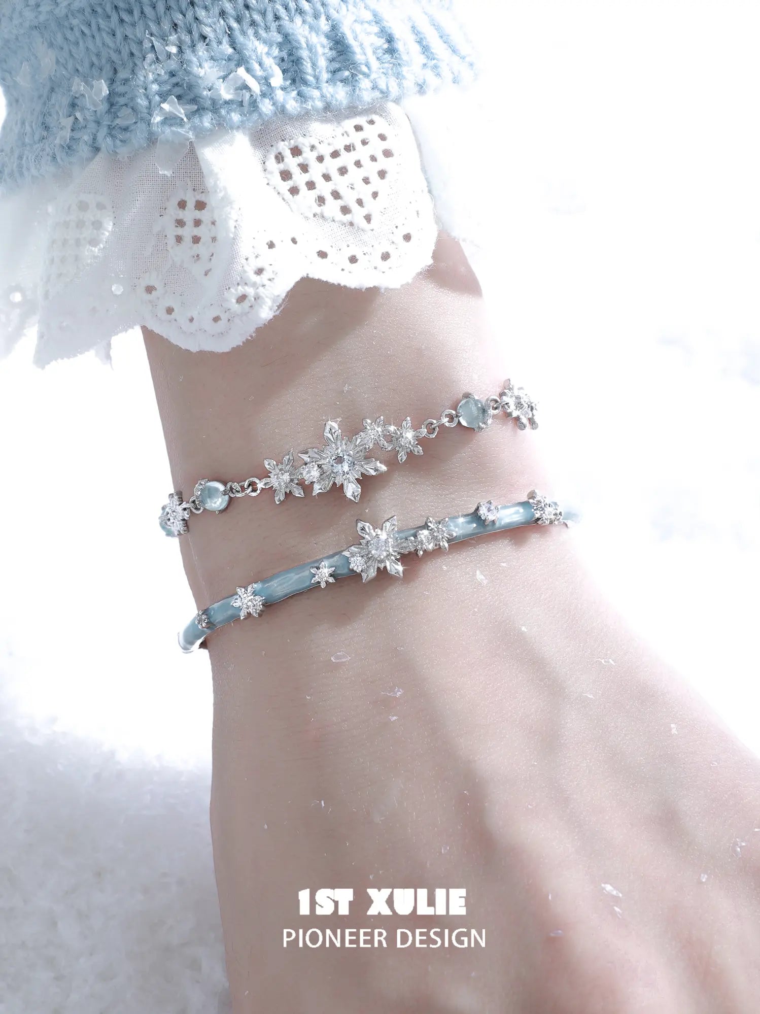1ST XULIE "Snow Land" Snowflake Charm Bracelet in Platinum Plated - Angle View 1