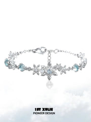 1ST XULIE "Snow Land" Snowflake Charm Bracelet in Platinum Plated - On Model Close-up