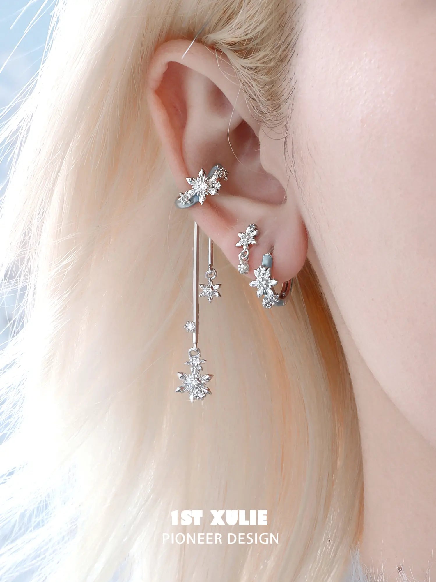 1ST XULIE Jewelry "Snow Land" Sparkling Snowflake Huggie & Stud Earrings in Platinum Plated - Detail Shot