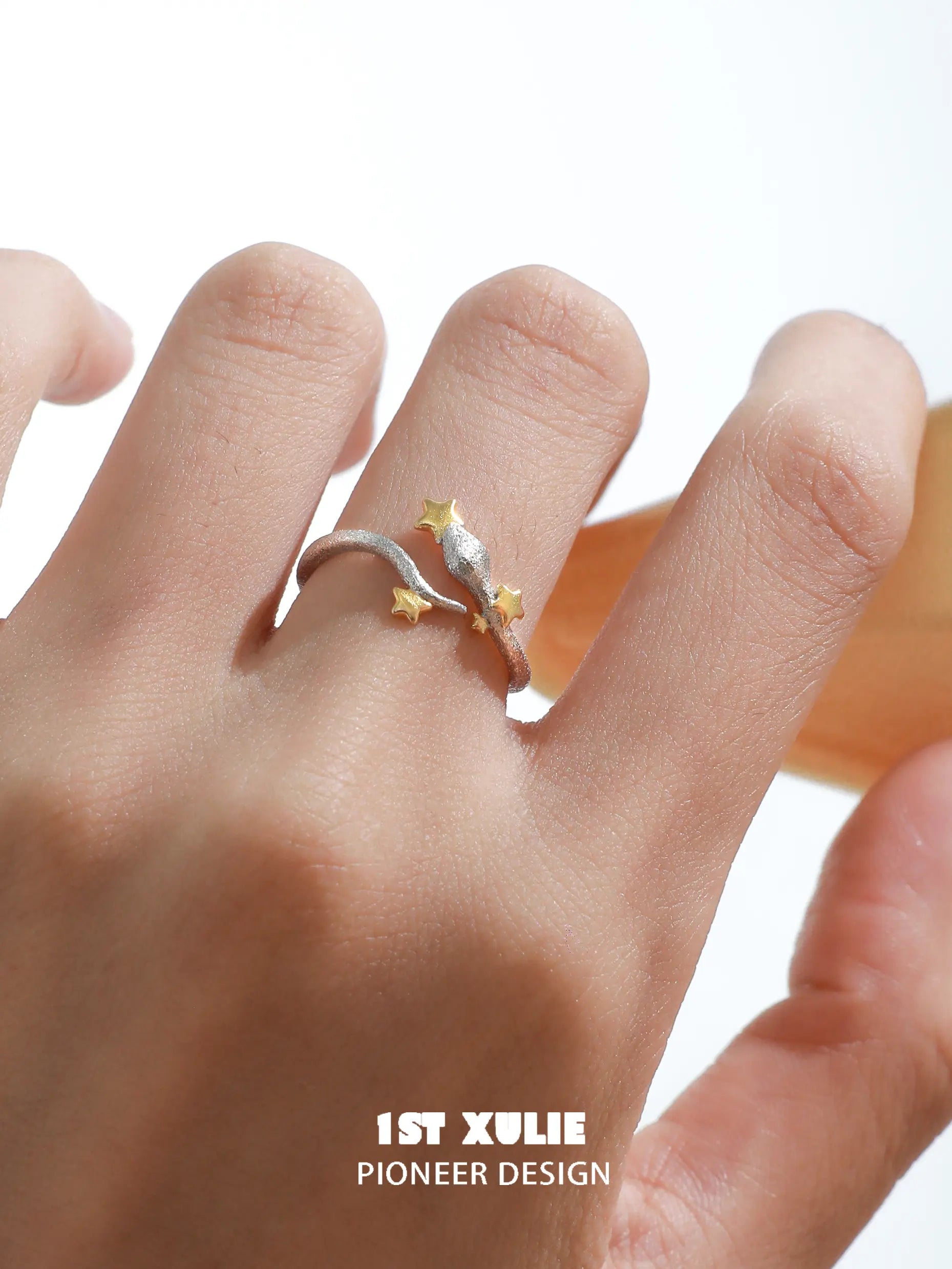 1ST XULIE Starry Sky Snake: Sterling Silver Snake Wrap Ring with Gold Stars - On Model