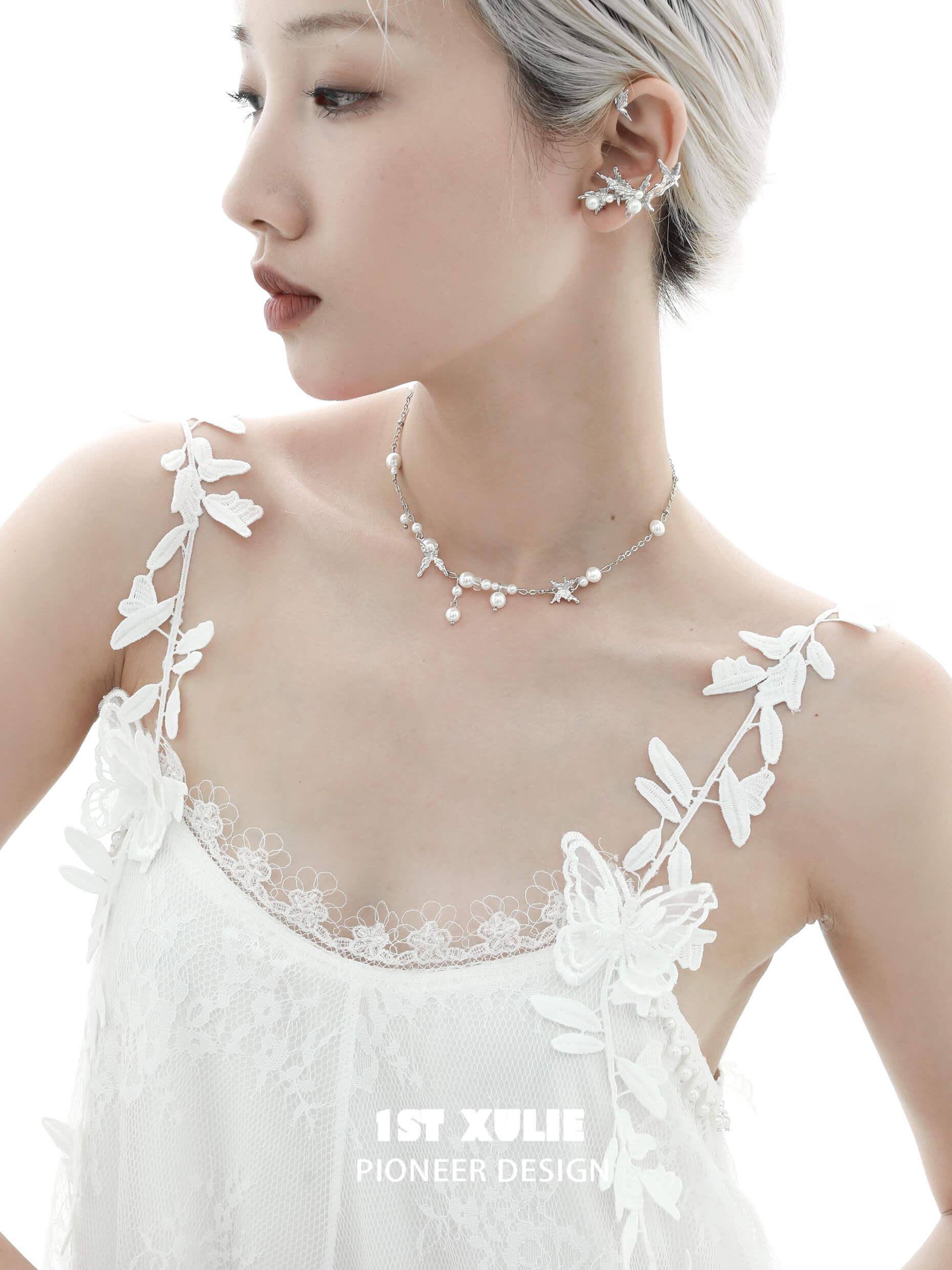 1ST XULIE "Whiterfly" Statement Butterfly Pearl Ear Wraps in Platinum Plated - Angled View