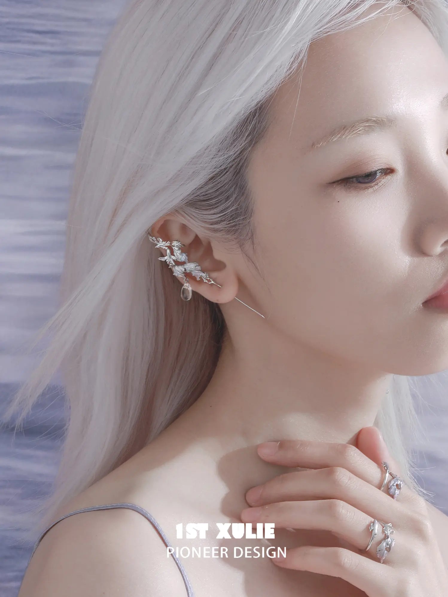 1ST XULIE Jewelry "THE SEA" Swimming Fish Needle Piercing Statement Earrings in Platinum Plated - Detail Shot