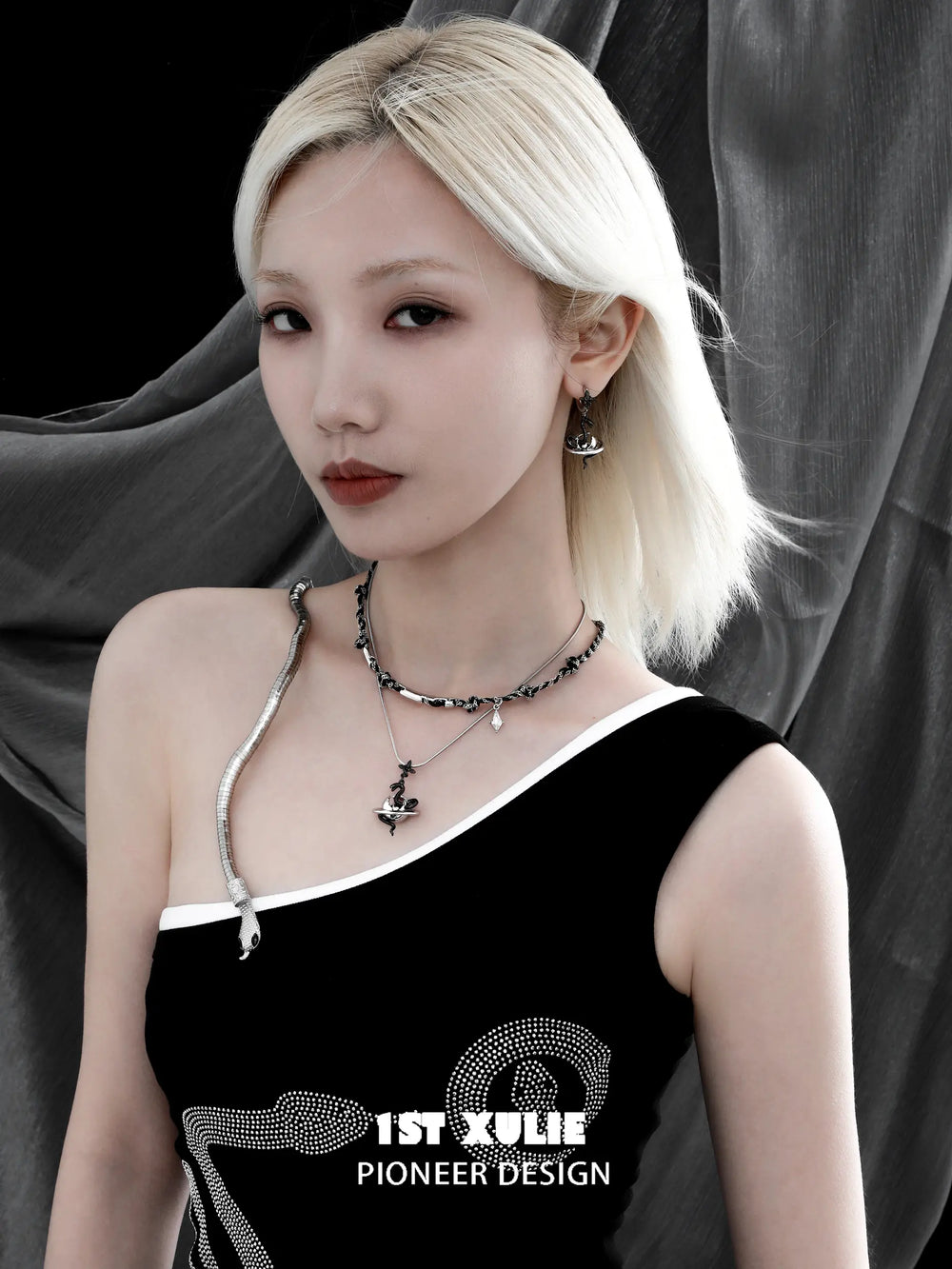 1ST XULIE "Snake Bite" Statement Two-Tone Serpent Dangle Earrings in Platinum & Black Gold Plated - Texture Shot