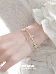 1ST XULIE Jewelry "Bastet" Vintage Iris Charm Bracelet in Rhodium Plated Brass - Detail Shot