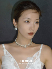 1ST XULIE "Whiterfly" White Shell Butterfly Necklace in Platinum & Titanium - Angled View