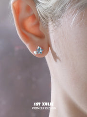 1ST XULIE Jewelry "WISHING STAR" Zirconia Wishing Star Stud Earrings in Rhodium Plated Brass - Lifestyle Shot