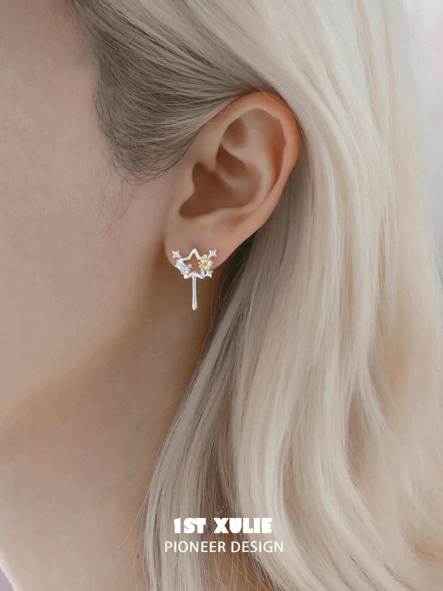 1ST XULIE Jewelry "WISHING STAR" Wishing Wand Zirconia Stud Earrings in Rhodium Plated - On Model