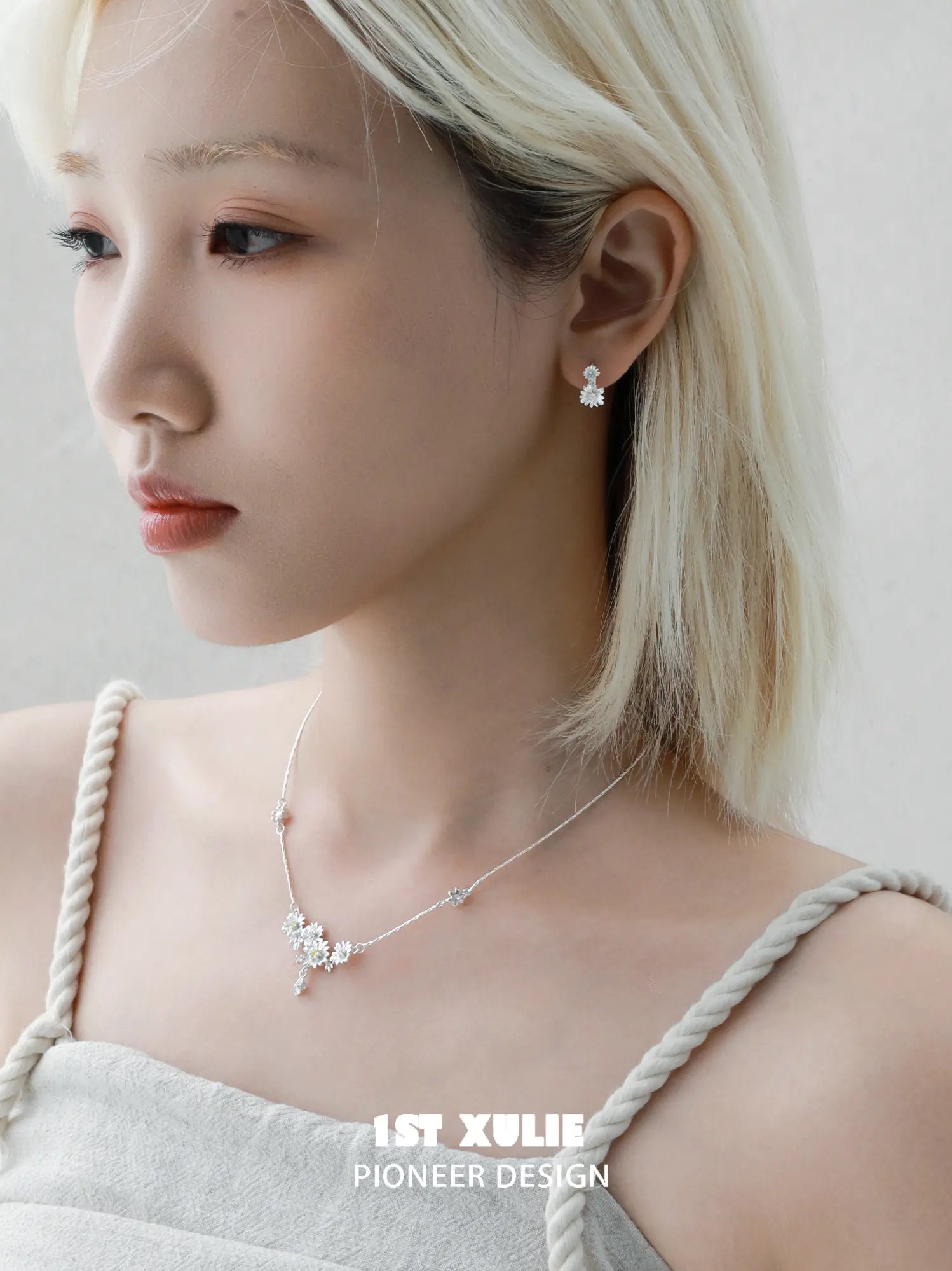 1ST XULIE Jewelry "DAISY" Dainty Daisy Huggie Hoop Earrings in 925 Sterling Silver - Angle 1