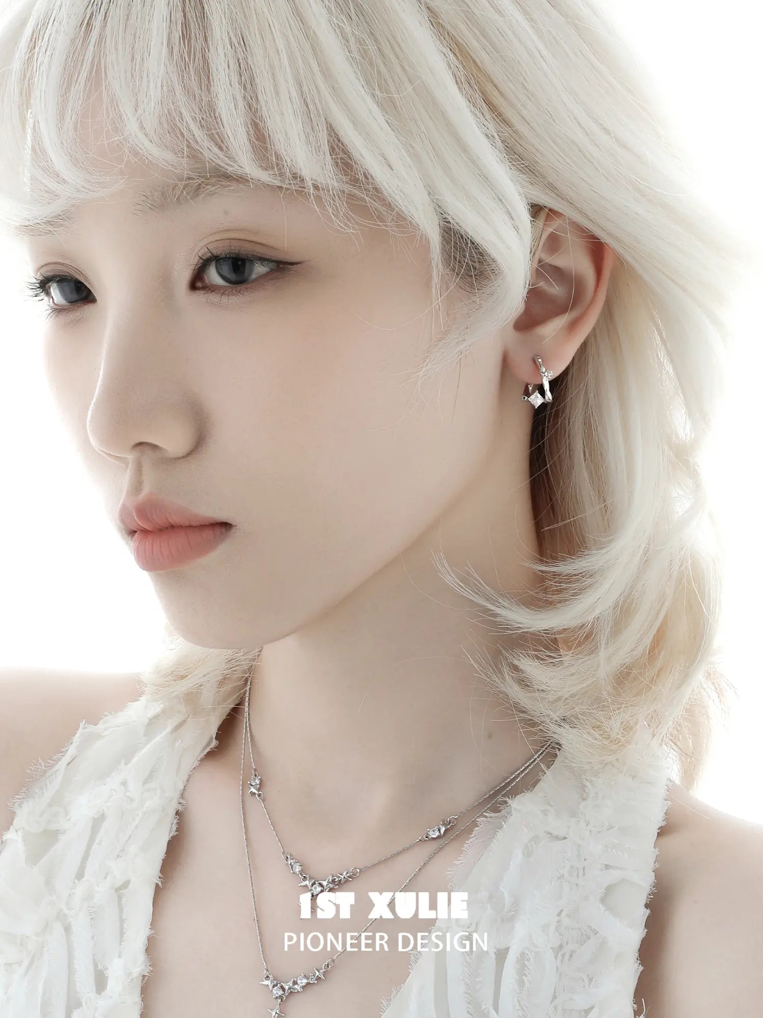1ST XULIE Jewelry "Silver Angel" Four-Pointed Star Huggie Earrings in 925 Sterling Silver - Angle View