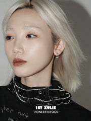 1ST XULIE Jewelry "Silver Angel" Four-Pointed Star Huggie Earrings in 925 Sterling Silver - Lifestyle Shot