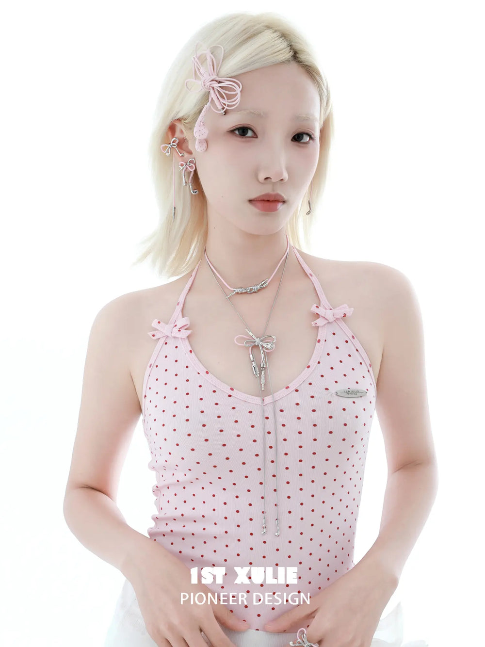 1ST XULIE Jewelry "MILLENNIUM SIGNAL" Y2K Bow Headphone Pendant Necklace in Rhodium Plated Brass - On Model Close Up