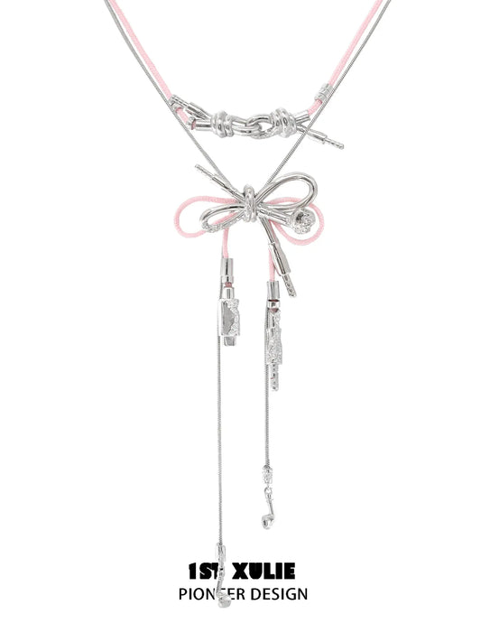 1ST XULIE Jewelry "MILLENNIUM SIGNAL" Y2K Bow Headphone Pendant Necklace in Rhodium Plated Brass - Full Product View