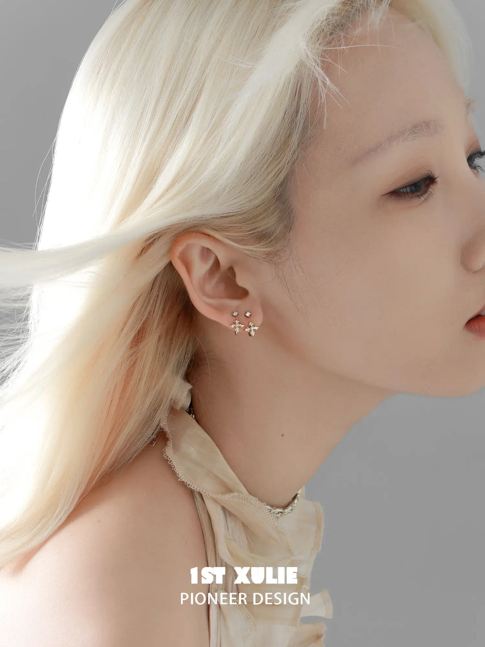1ST XULIE Jewelry "Bastet" Zirconia Iris Floral Stud Earrings in 18K Gold Plated Brass - Lifestyle Shot