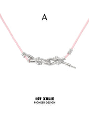 "MILLENNIUM SIGNAL" Rhodium Plated Y2K Bow Headphone Statement Pendant Necklace - Image 13