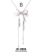"MILLENNIUM SIGNAL" Rhodium Plated Y2K Bow Headphone Statement Pendant Necklace - Image 14
