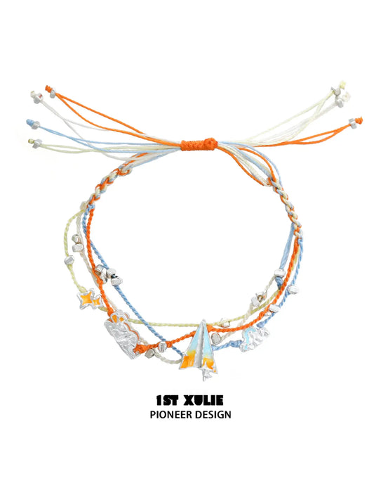 Juicy Flight Orange Sea Paper Plane Braided Rope Bracelet™