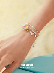 Juicy Flight Orange Sea Paper Plane Braided Rope Bracelet™