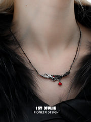 Lucifer Red Crystal 18K Black Gold Feather Necklace™