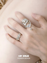 Armor ring and a small coordinating ring worn on a hand