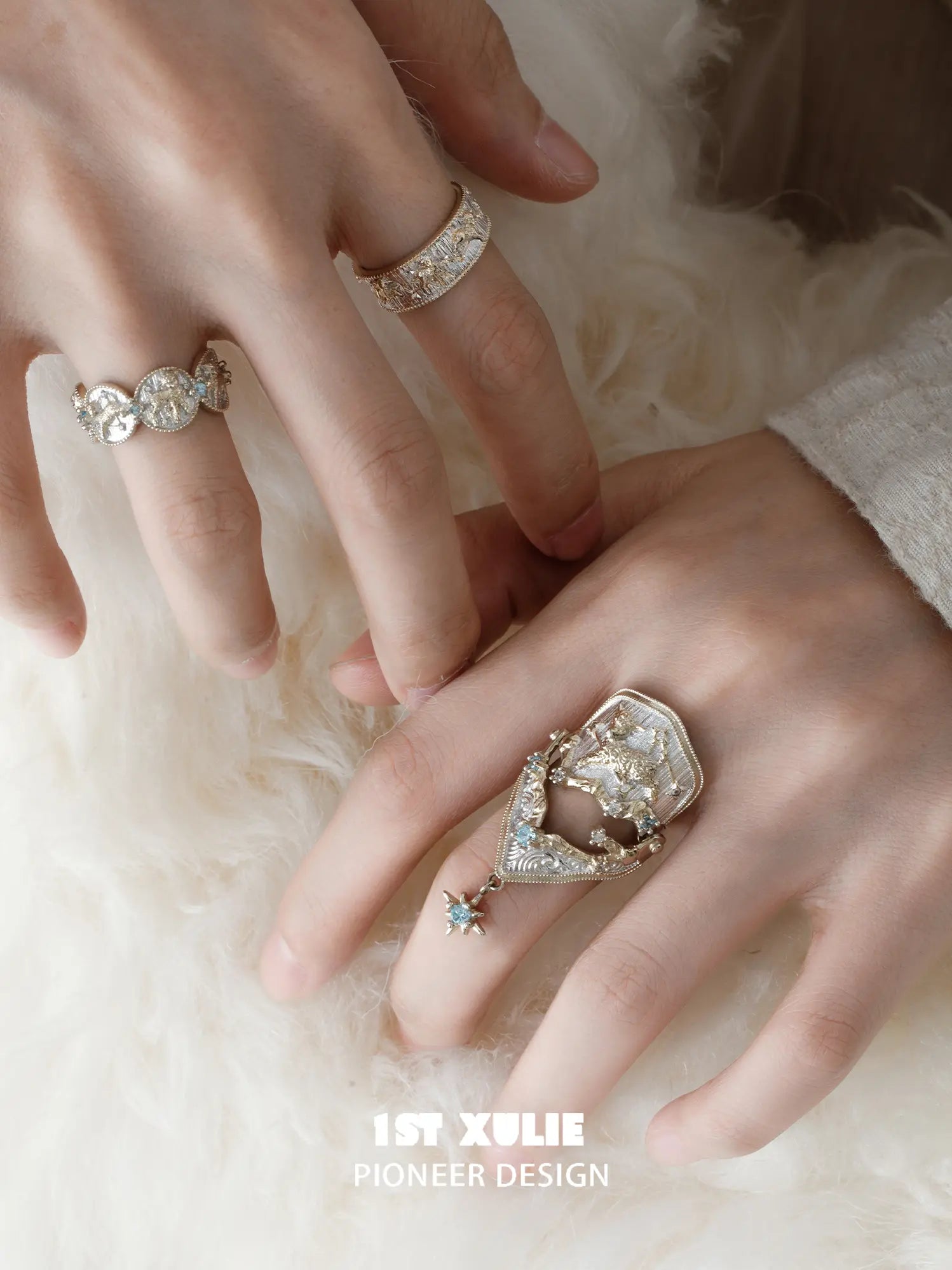 Celestial armor ring with a hanging star worn with coordinating jewelry