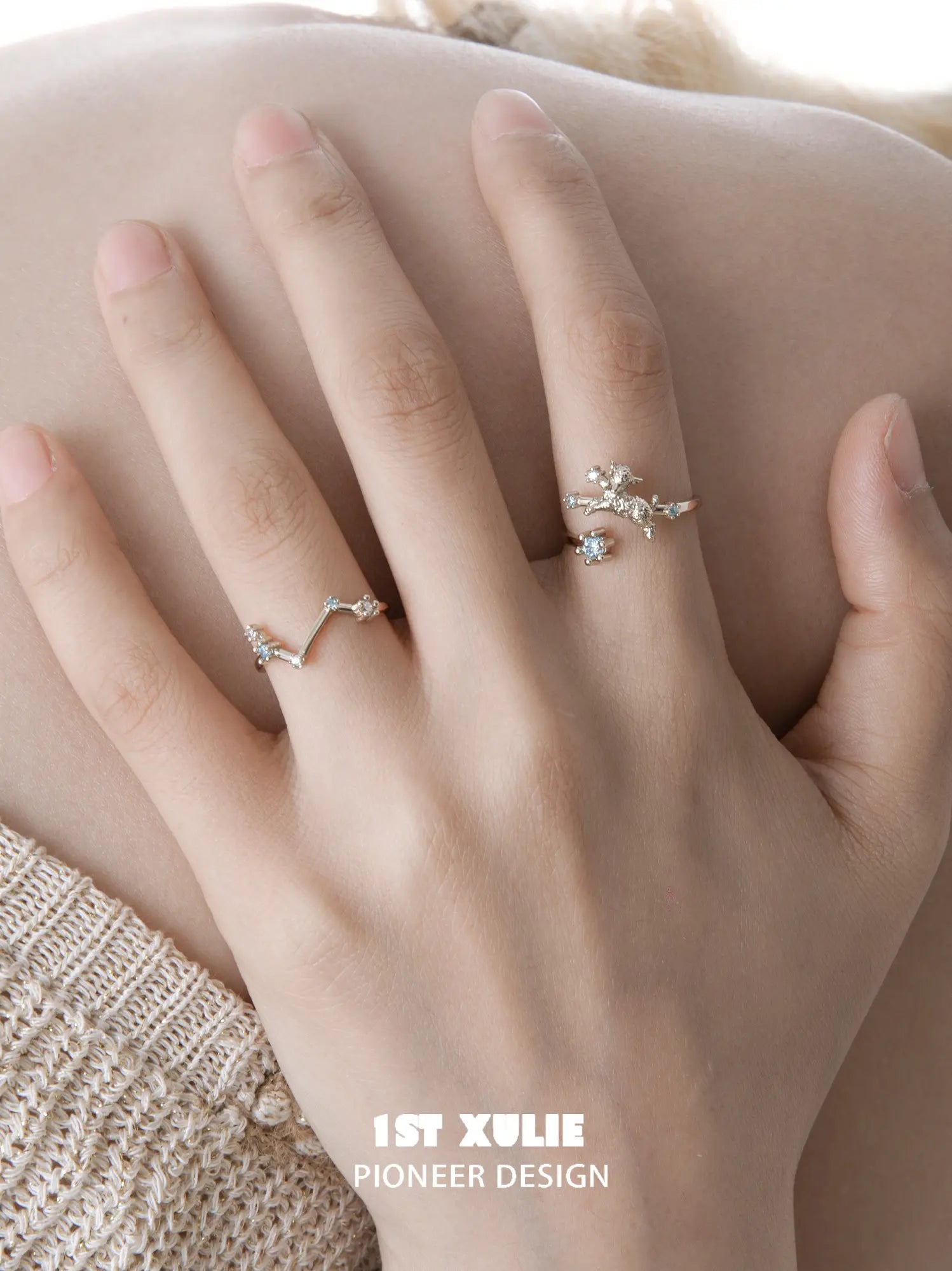 Ram and constellation open rings worn with coordinating jewelry