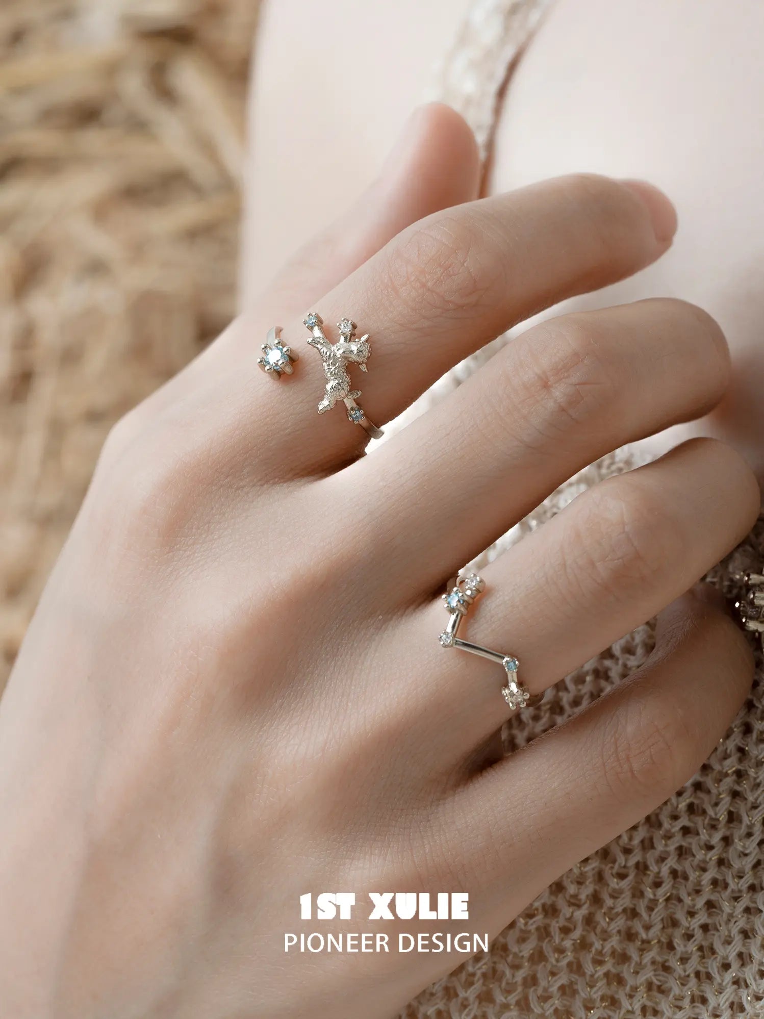 Ram and constellation open rings worn with coordinating jewelry