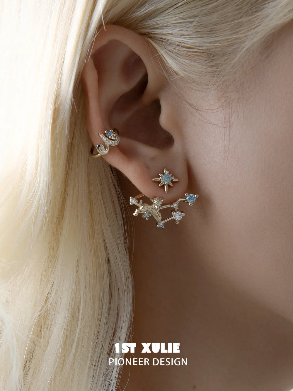 Celestial ram and star ear cuffs worn along the ear