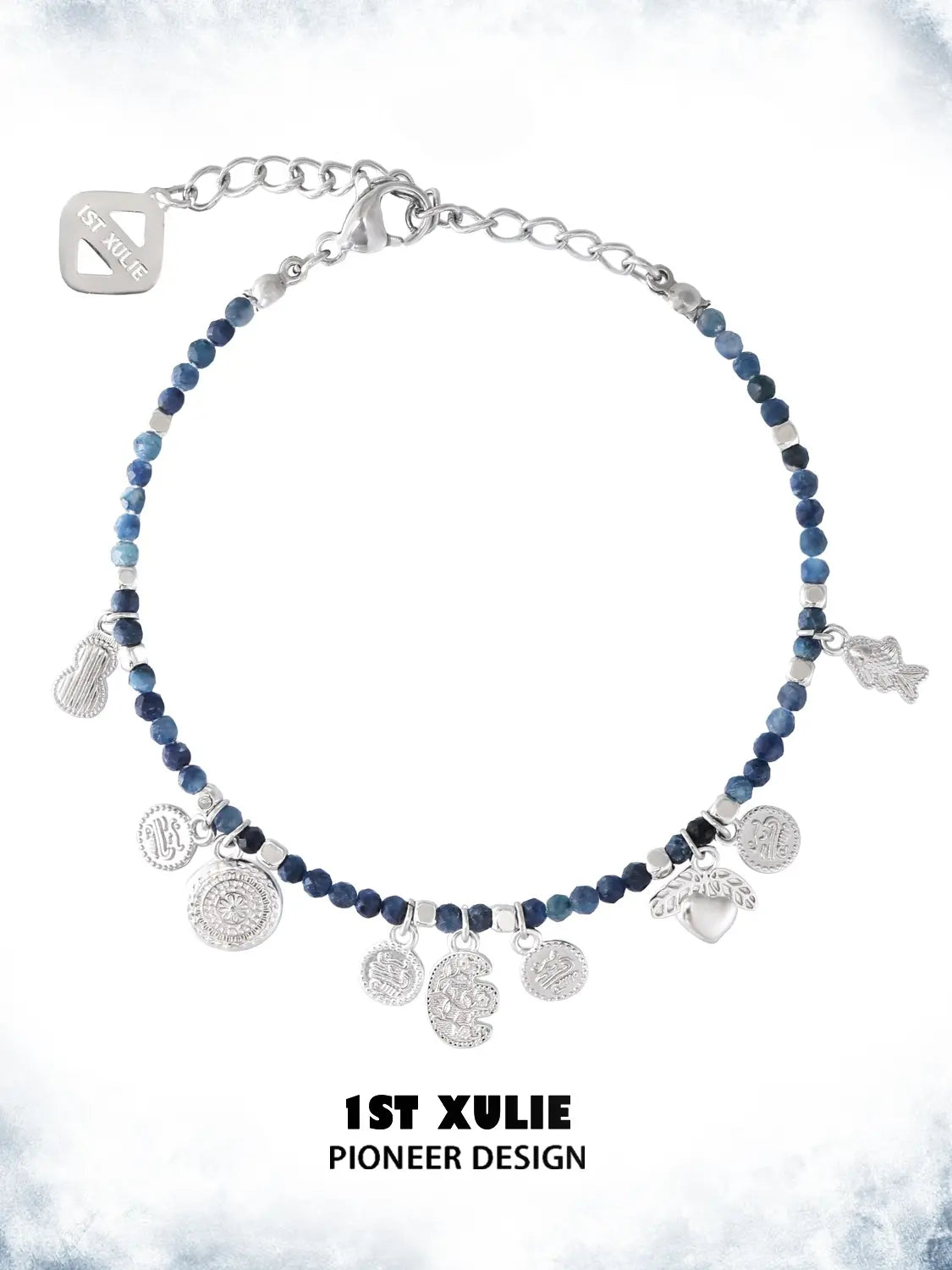 Blue beaded charm bracelet showing the ornamental details and overall silhouette