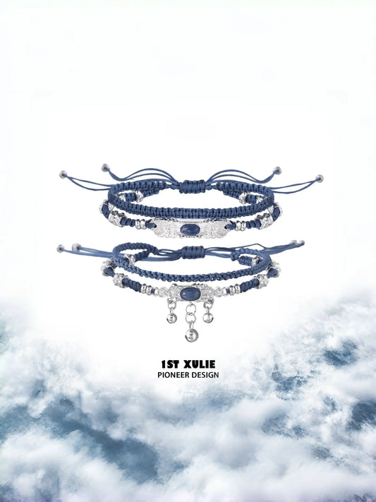 Blue braided charm bracelets showing the ornamental details and overall silhouette