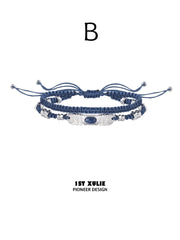 Style B blue braided bracelet with an oval blue accent