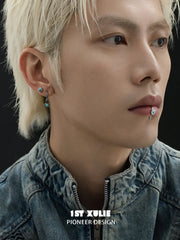 Model wearing the blue eye lip cuff with coordinating earrings