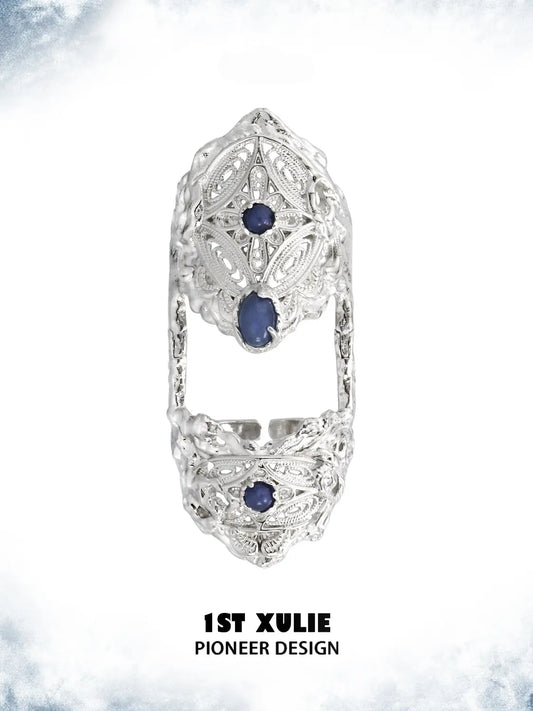 Blue stone articulated ring showing the ornamental details and overall silhouette