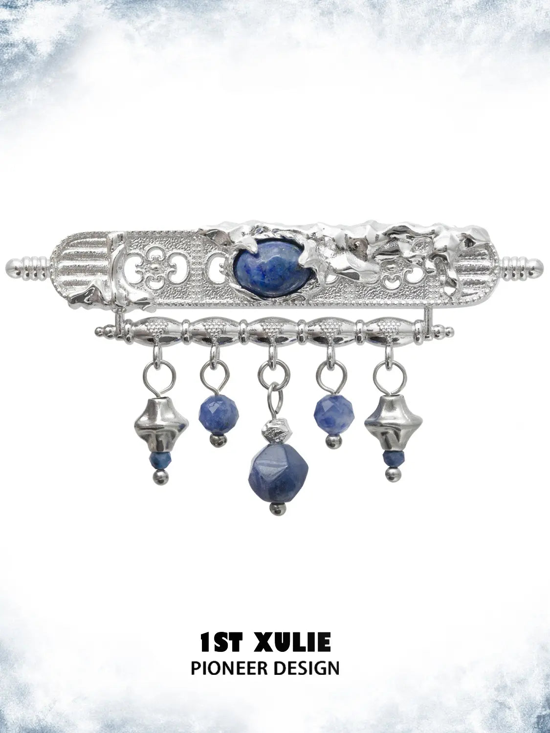 Blue stone tassel brooch showing the ornamental details and overall silhouette